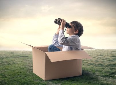 Young explorer using binoculars Children and Teens
